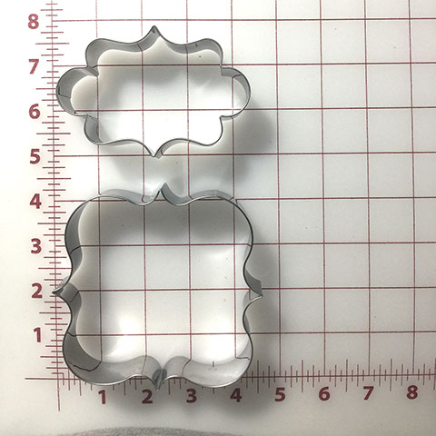 X-large and XX-large dog treat cutters shaped like call-out banners