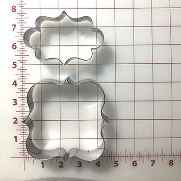 X-large and XX-large dog treat cutters shaped like call-out banners